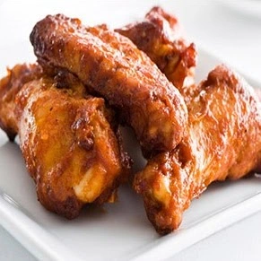 Saucy halal chicken wings at Donair and Poutine House in Edmonton, AB